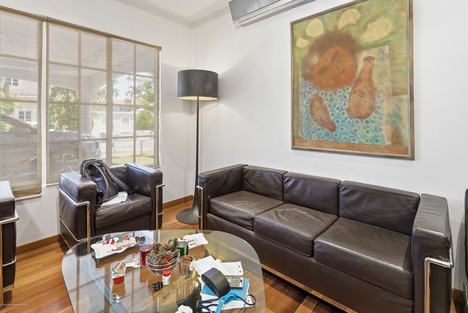 Costa del Este living room as captured on-site before digital declutter, Panama luxury real estate photography.