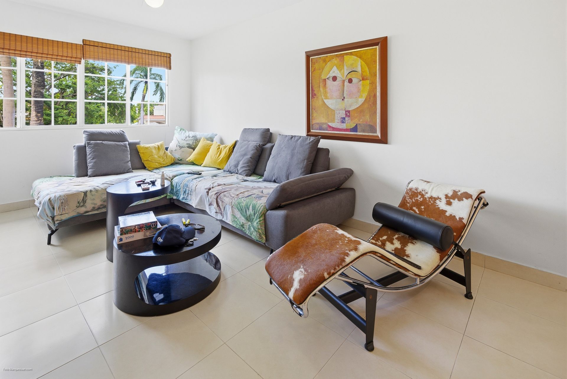 Costa del Este living room as captured on-site before digital declutter, Panama luxury real estate photography.