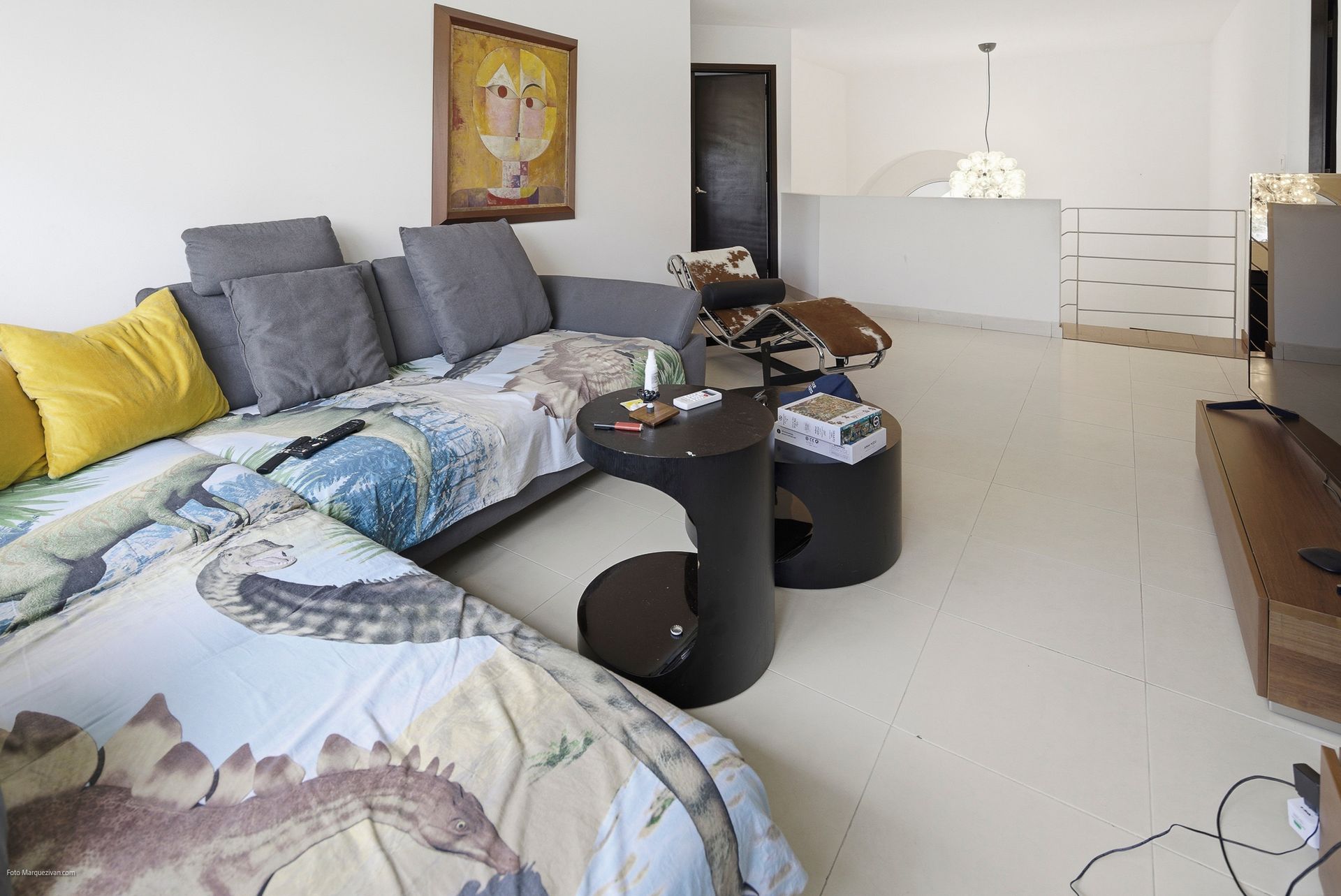 Costa del Este living room as captured on-site before digital declutter, Panama luxury real estate photography.