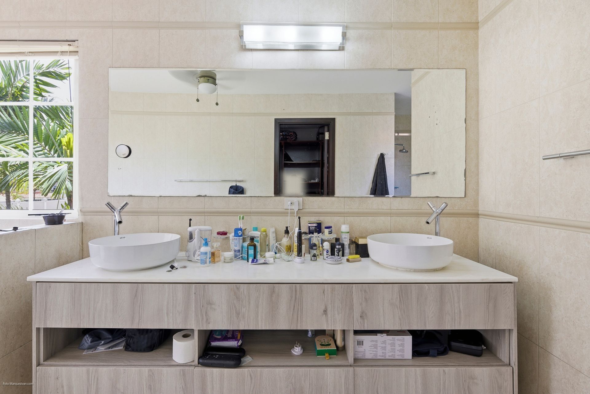 Costa del Este master bathroom as captured on-site before digital declutter, Panama luxury real estate photography