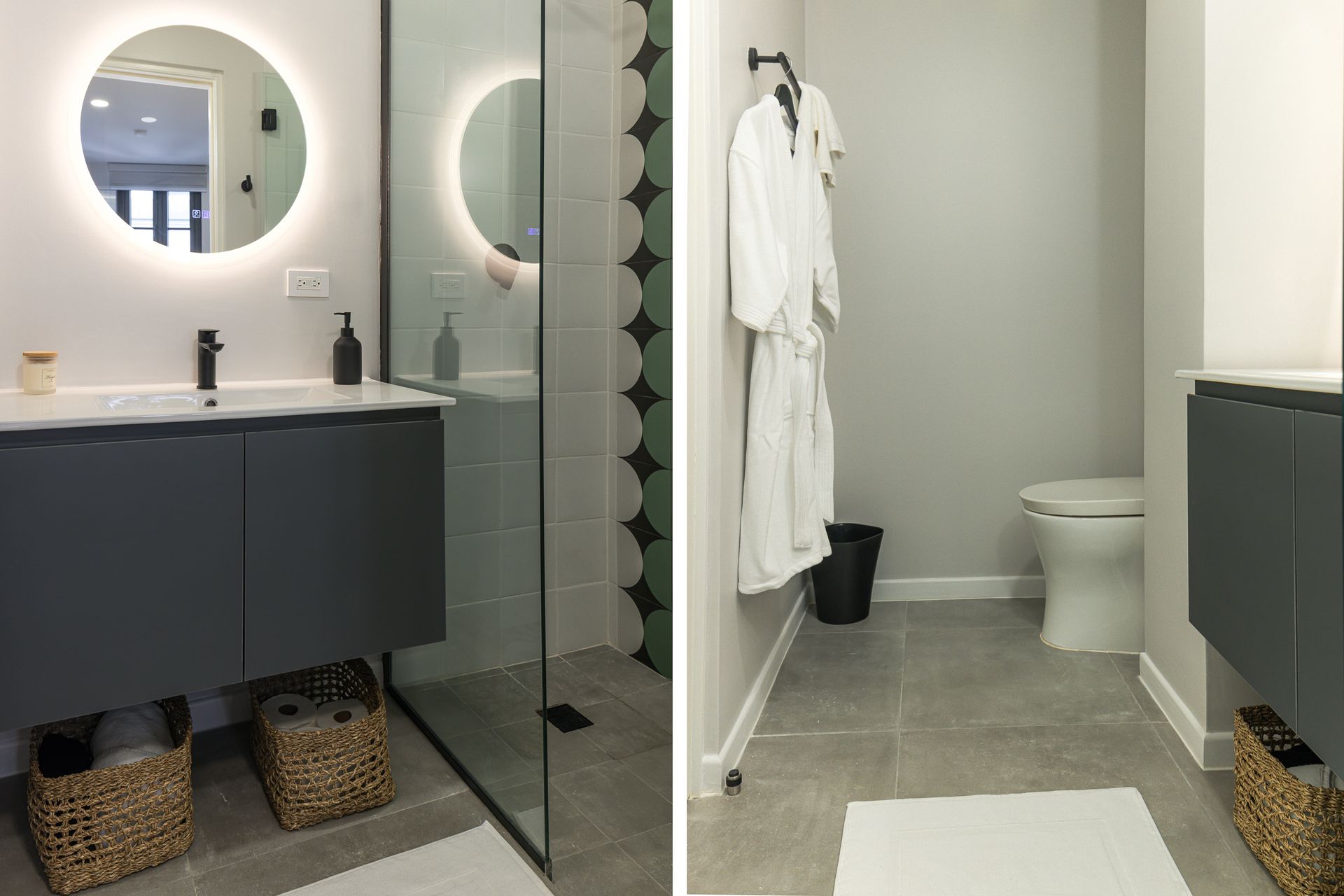 Elegant dark-toned bathroom with round mirror and designer fixtures in boutique Airbnb Casco Viejo Panama