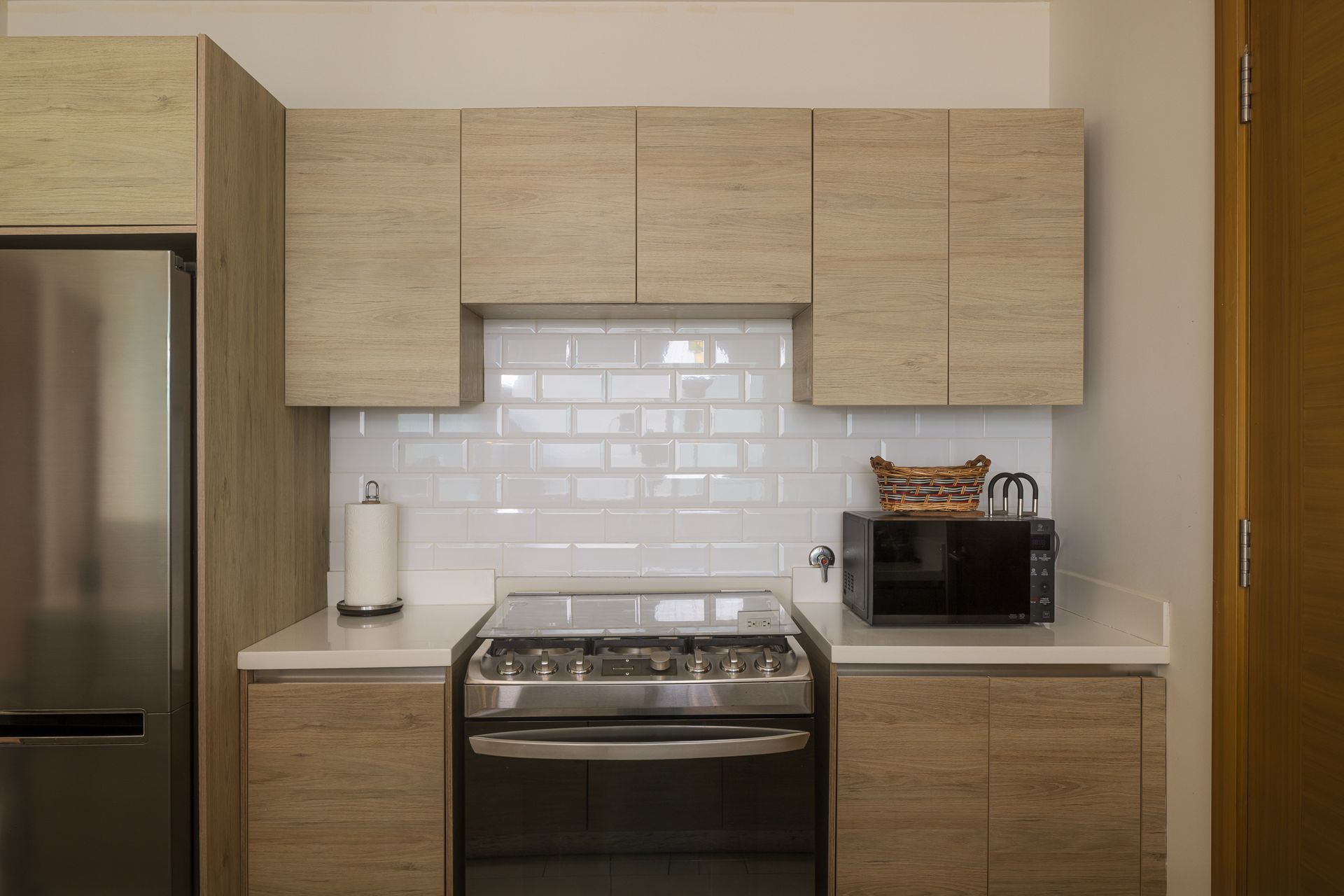 Modern fully-equipped kitchen in Airbnb apartment at Playa Escondida Resort, Colón, Panama

