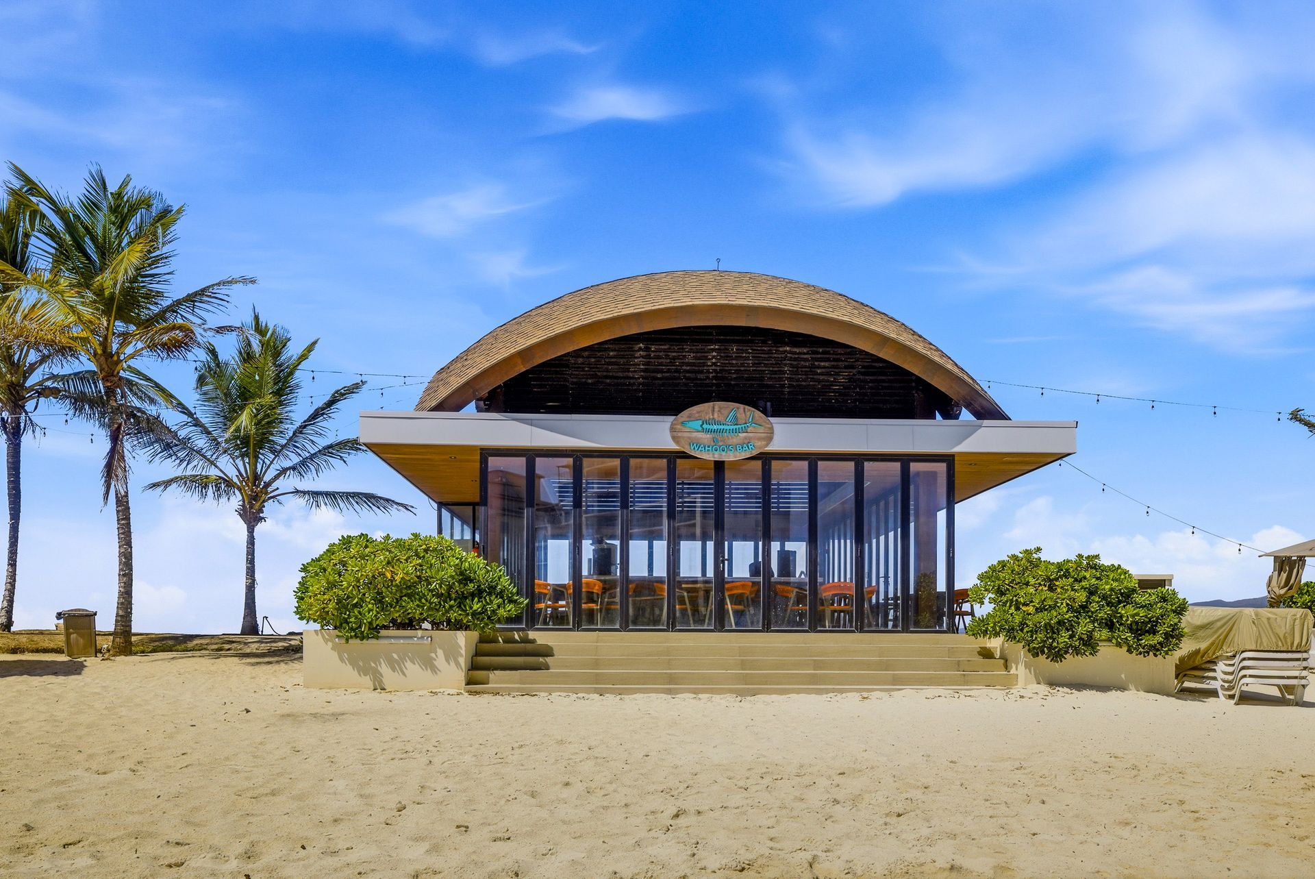 Thatched-roof beach clubhouse amenity at Playa Escondida Resort on Panama's Caribbean coast