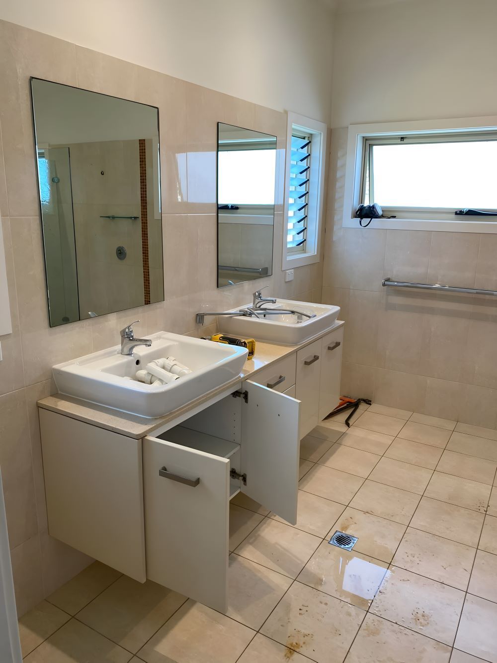 A Bathroom With Two Sinks And Two Mirrors — Coffs Coast Designer Bathrooms in Urunga, NSW