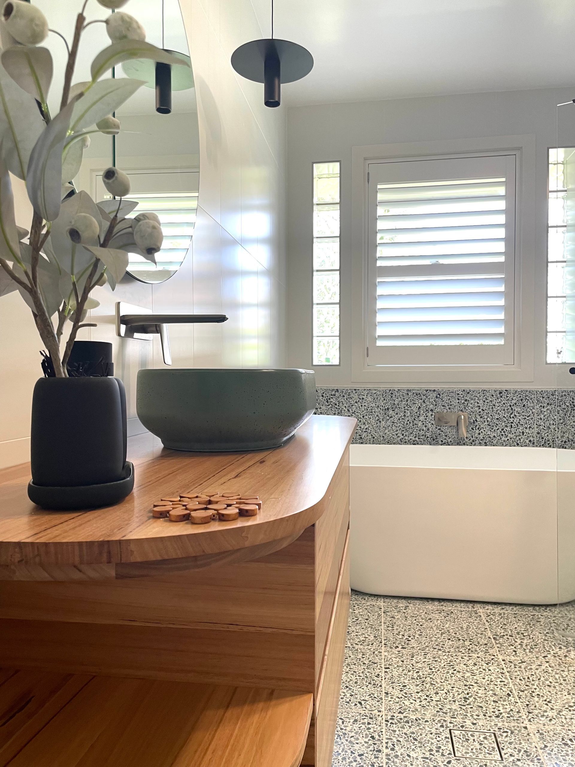 A Bathroom With A Sink, Tub, And Mirror — Coffs Coast Designer Bathrooms in Toormina, NSW