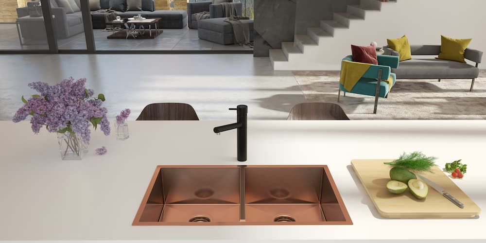 Kitchen With A Sink And A Table With A Vase Of Flowers — Coffs Coast Designer Bathrooms in Toormina, NSW