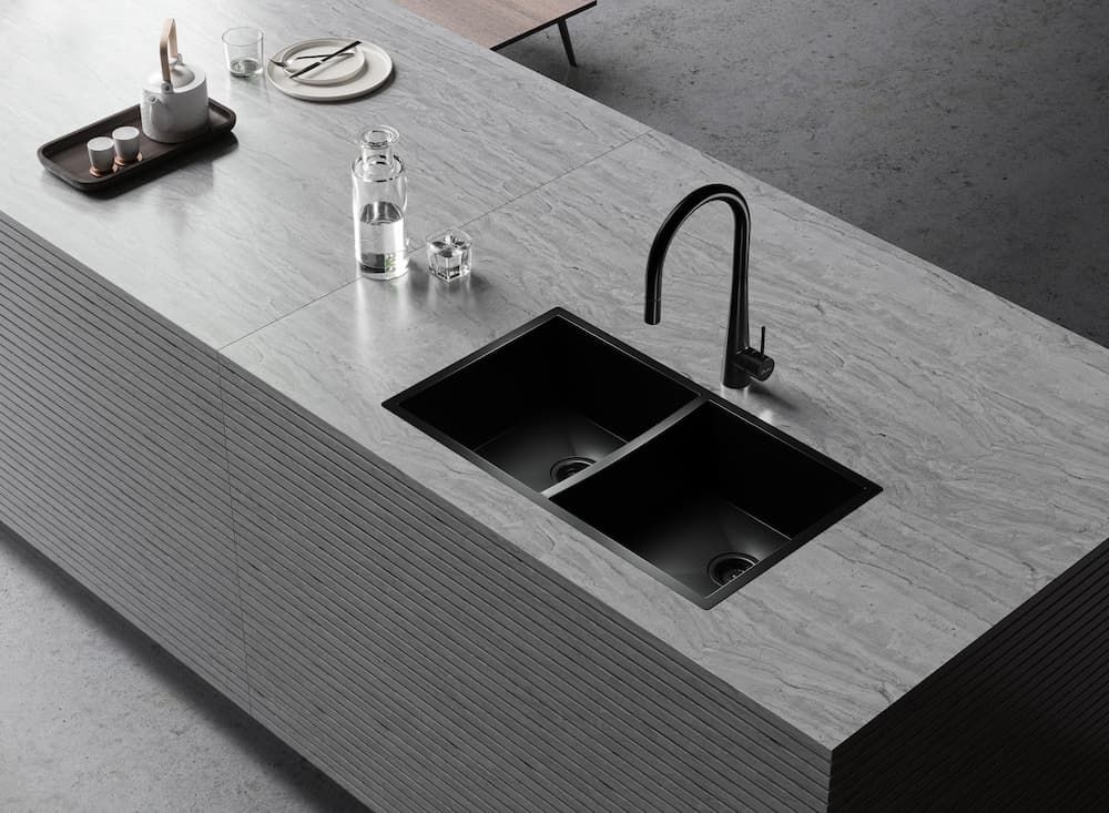 Grey And Black Kitchen Countertop — Coffs Coast Designer Bathrooms in Toormina, NSW