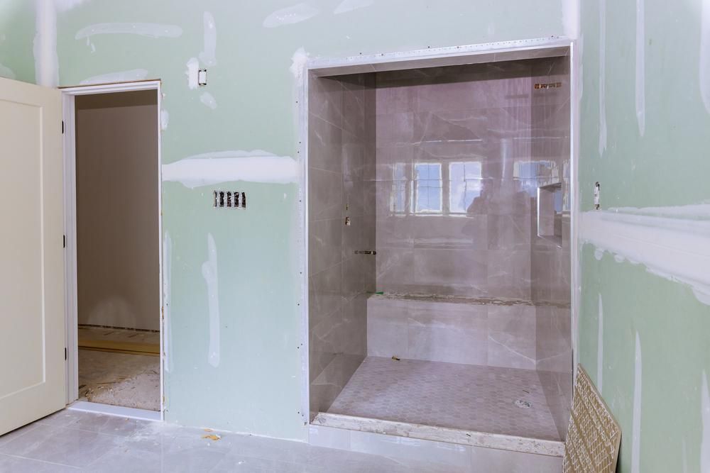 A Bathroom Under Construction with A Walk in Shower — Highline Carpentry in Kahibah, NSW