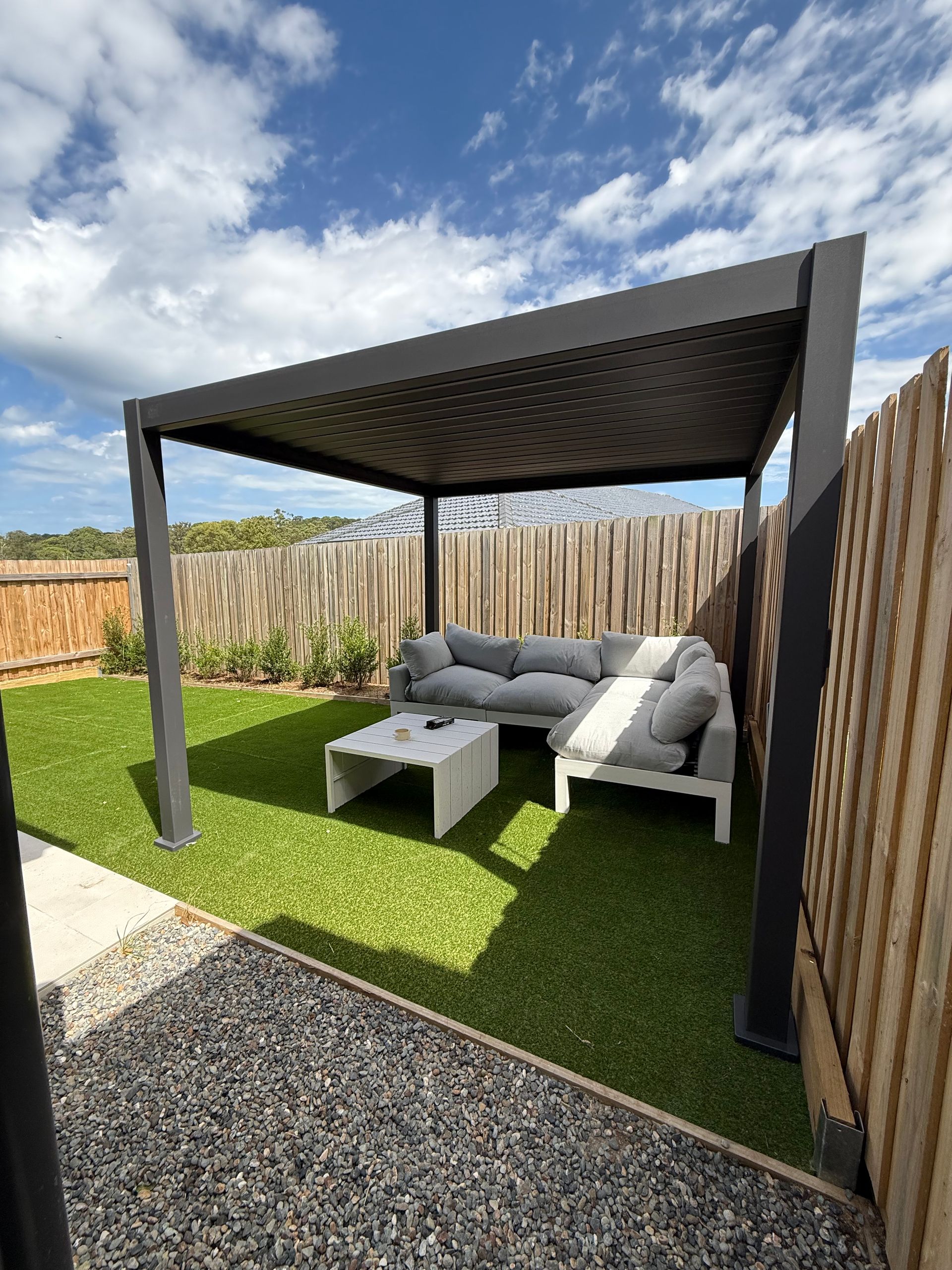 A Person is Measuring a Piece of Wood With a Ruler and Pencil — Highline Carpentry in Kahibah, NSW