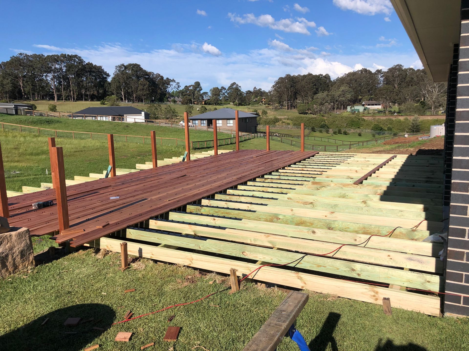 The Ceiling of A Building Is Made of Wooden Beams — Highline Carpentry in Kahibah, NSW