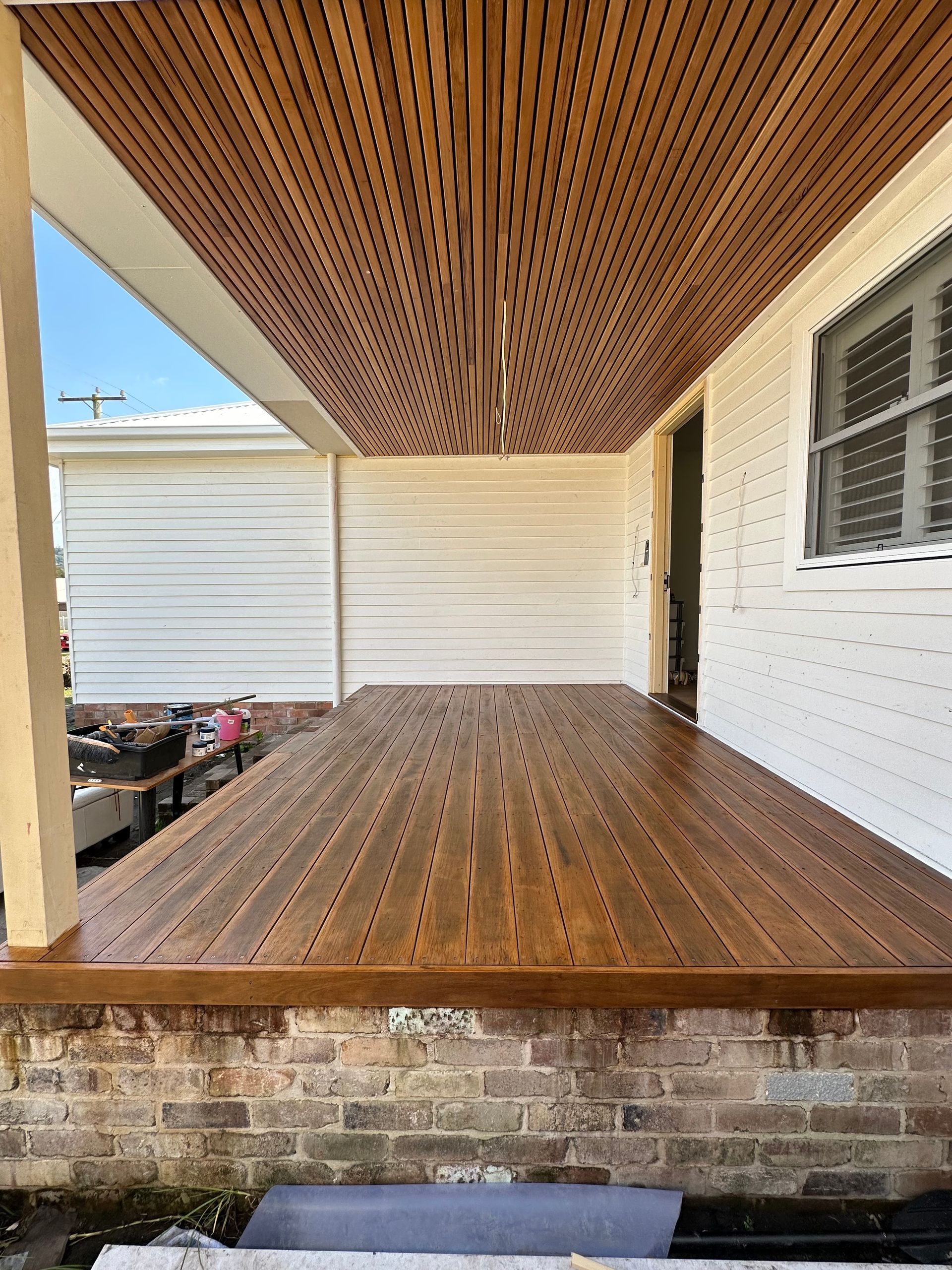 Two Construction Workers Are Working on A Building Under Construction — Highline Carpentry in Kahibah, NSW