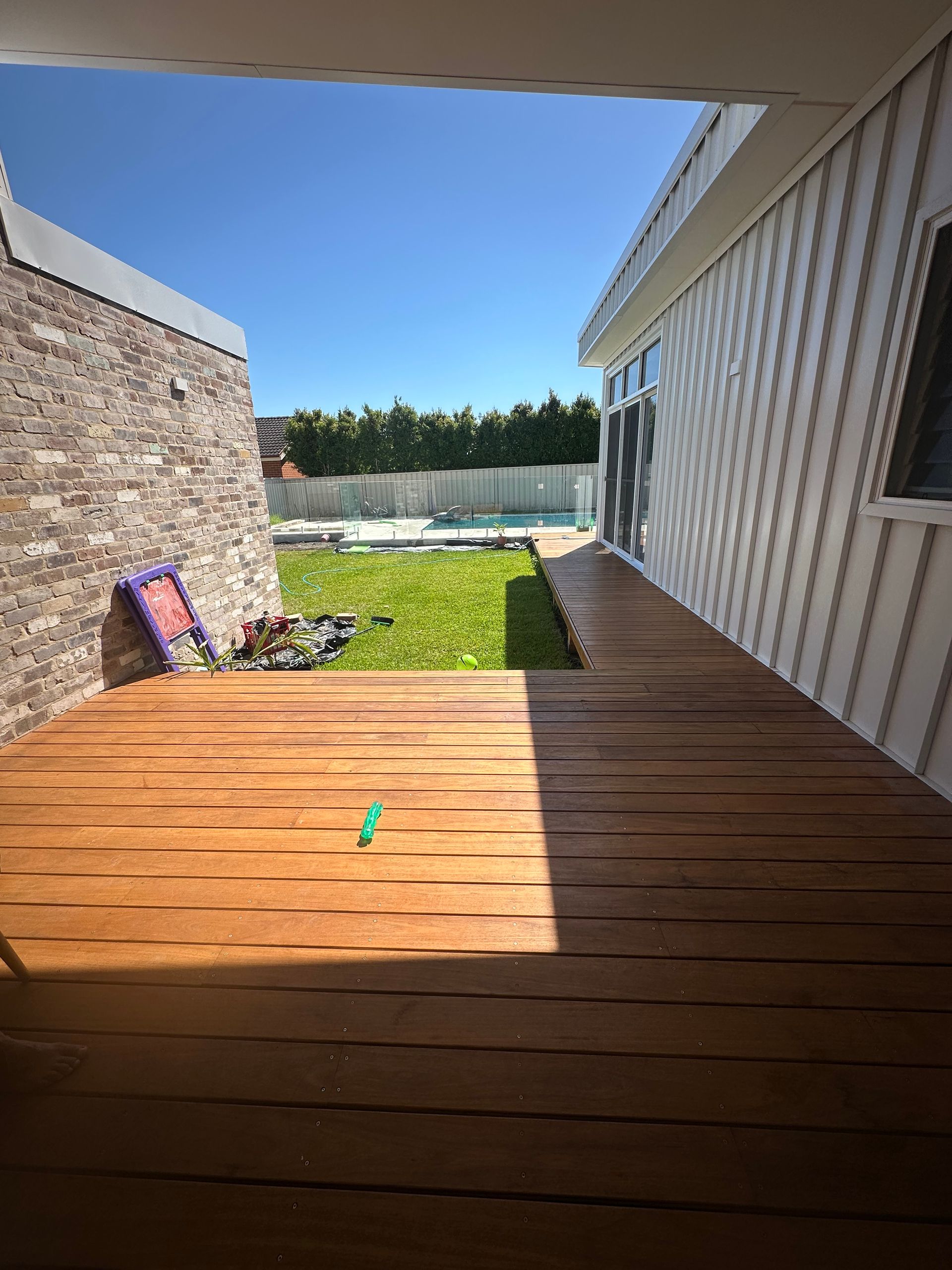 A Wooden Deck Is Being Built in Front of A House — Highline Carpentry in Kahibah, NSW