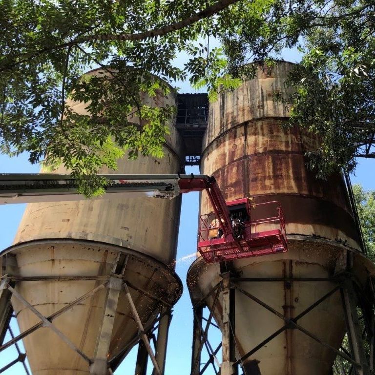 Tanks and Trees — Origin Group in Paget, QLD