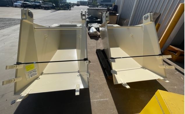 Two Pieces Of Metal Are Sitting Next To Each Other — Origin Group in Paget, QLD