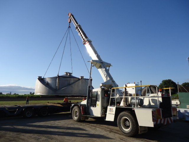 A White Truck With A Crane Attached To It — Origin Group in Paget, QLD