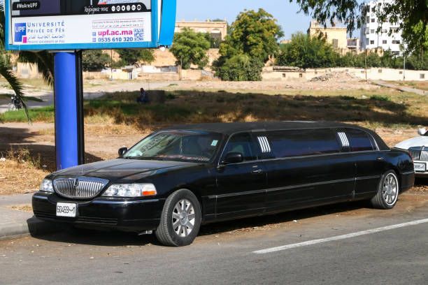 A sleek black limousine was parked, representing a luxury limo rental service.