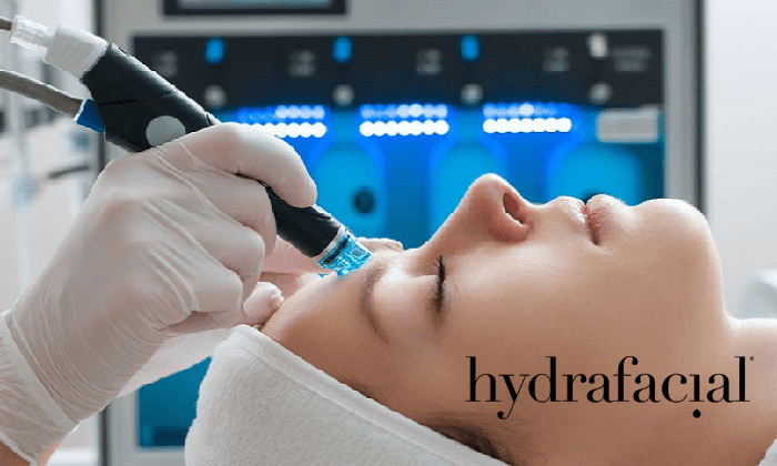 a woman is getting a hydrafacial treatment on her face