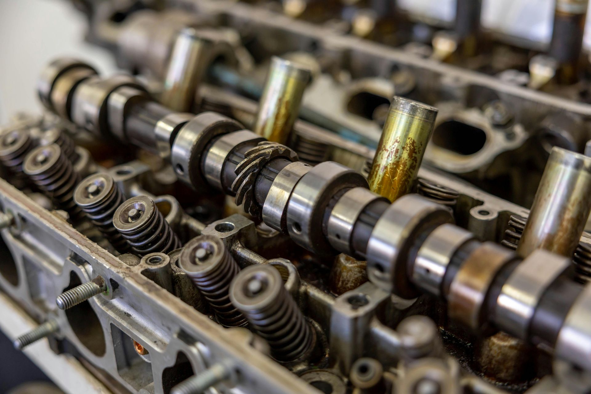 A close up of the inside of a car engine.