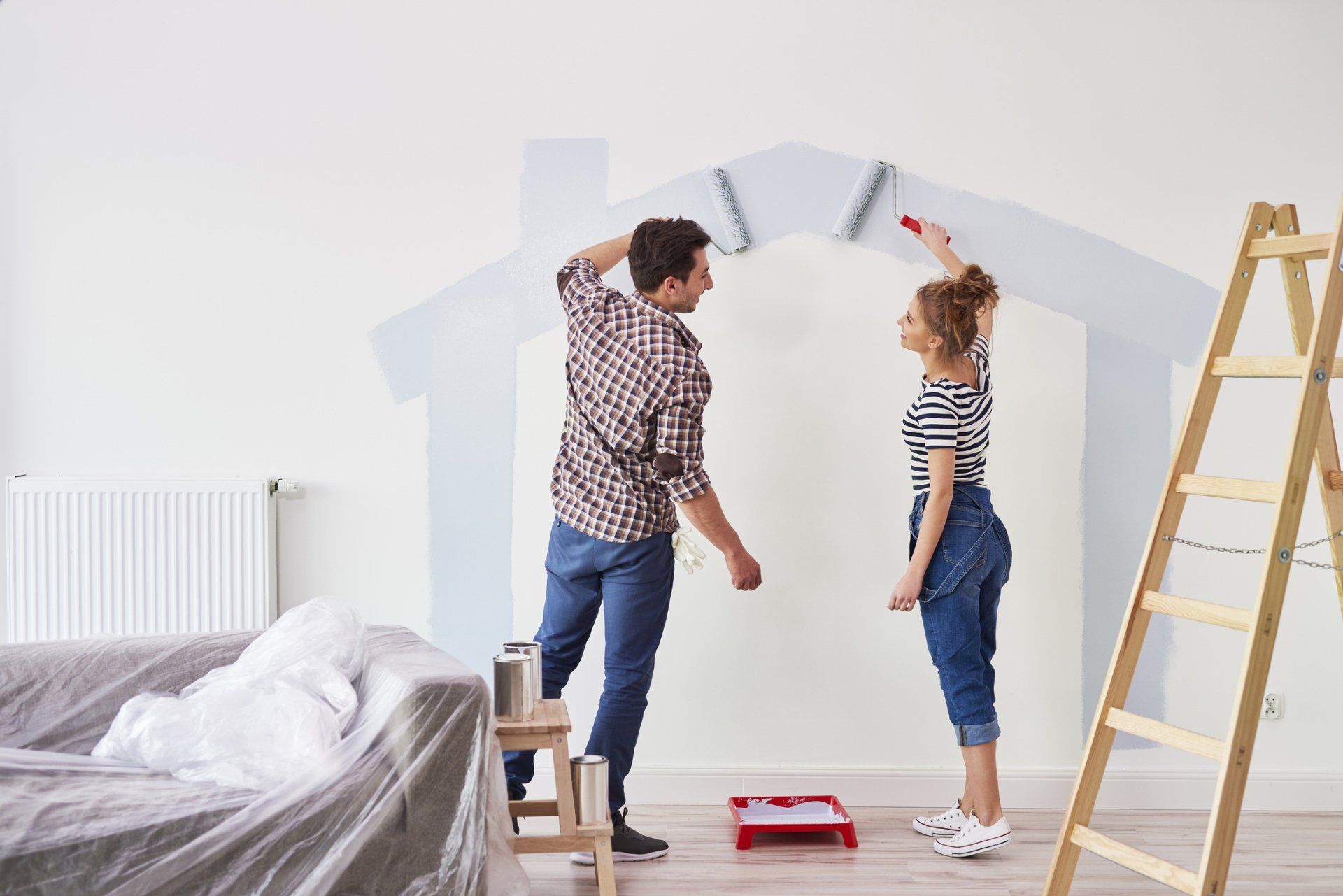 Couple painting wall - linked to Build page