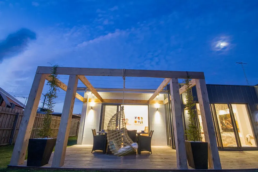 Outdoor House View with Chairs, Tables and Hanging Adult Cradle | Indented Head, Vic | Coastyle Building Solutions