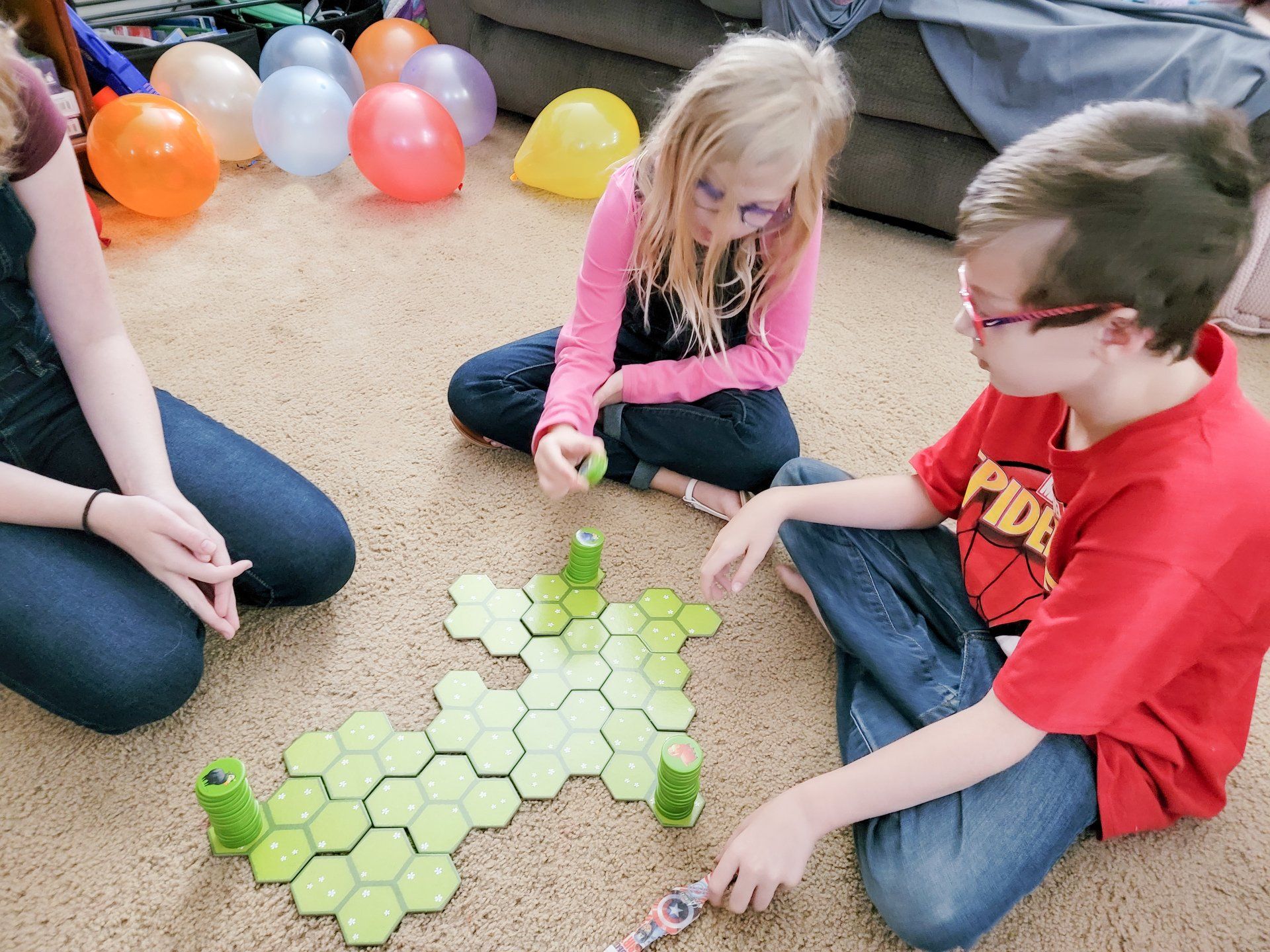 the homeschool family stuff kids playing battle sheep from timberdoodle