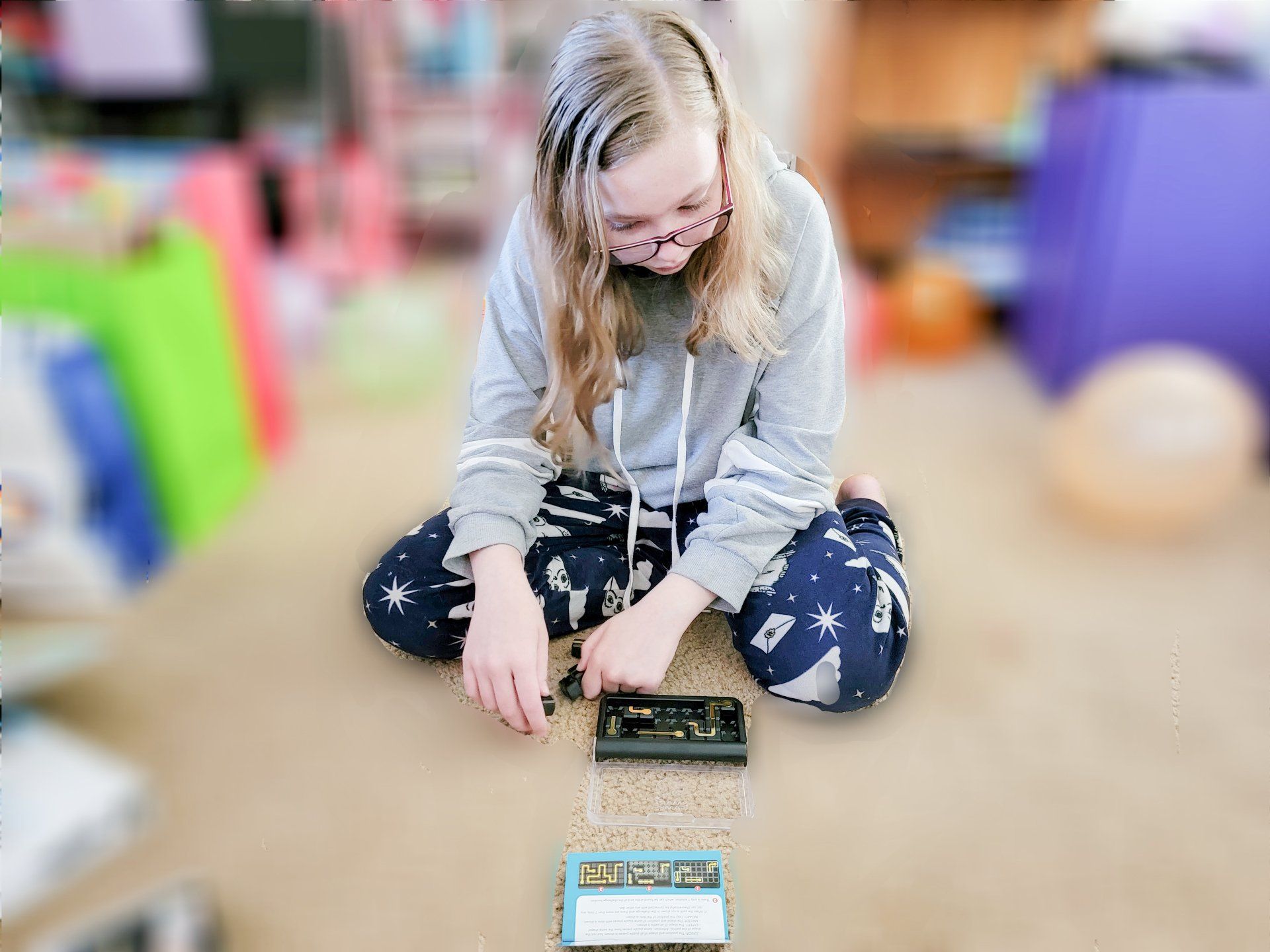 Ella from homeschool family stuff playing IQ Circuit from Timberdoodle