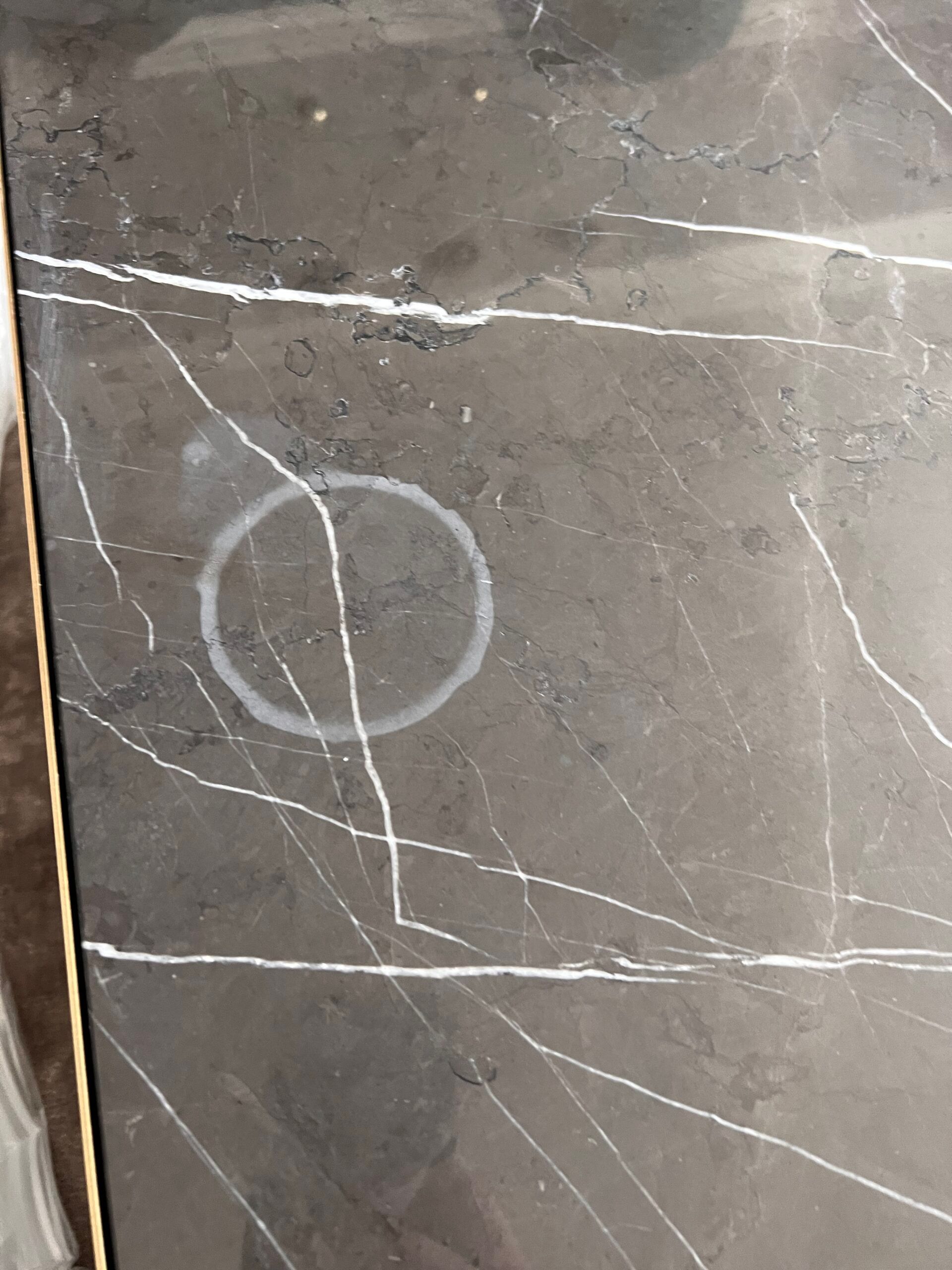 A marble countertop with ring marks in New Jersey