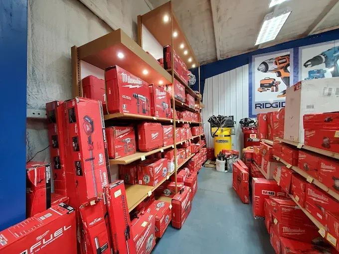 A store filled with lots of red boxes and tools