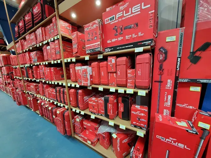 A store filled with lots of red boxes including one that says cofuel