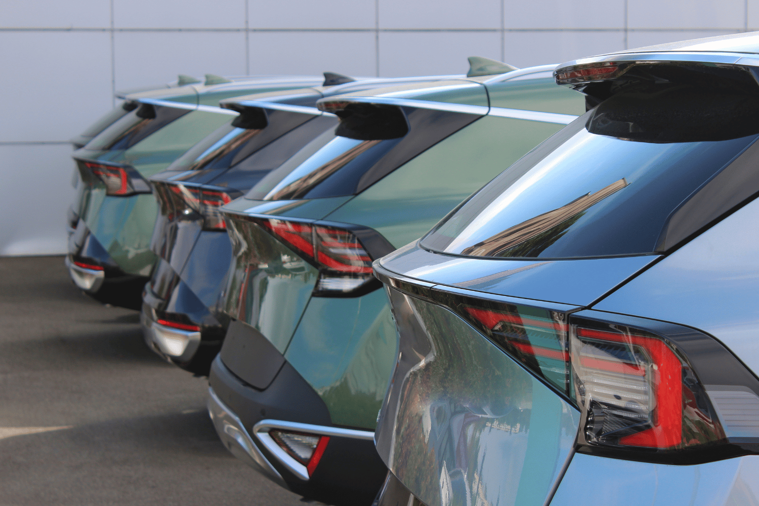 Blue smartphone with a blue credit card floating beside it.