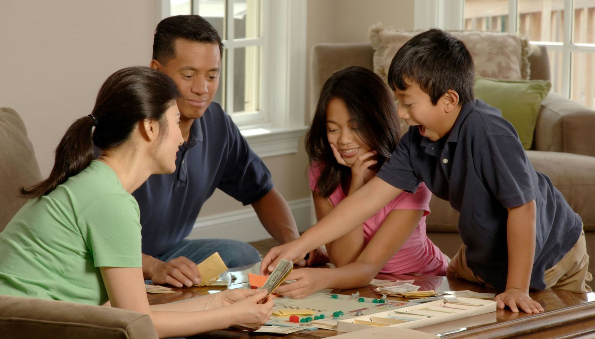 happy family playing a game