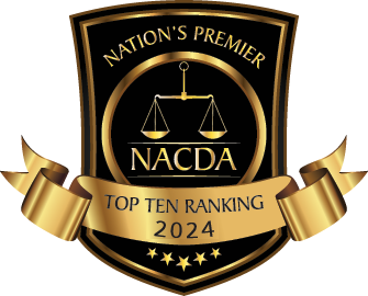 Black-and-gold NACDA badge reading “Nation’s Premier” and “Top Ten Ranking 2024” with a scale emblem and stars
