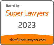 Super Lawyers 2023 badge with orange and white design, reading “Rated by Super Lawyers” and “visit SuperLawyers.com”