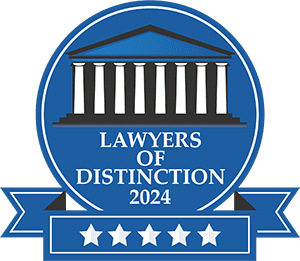 Blue award badge with courthouse icon and text “Lawyers of Distinction 2024” with five stars