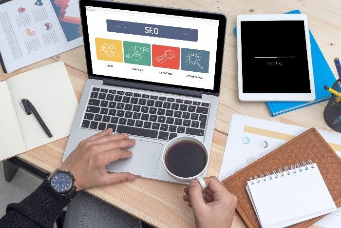 Person working on laptop with