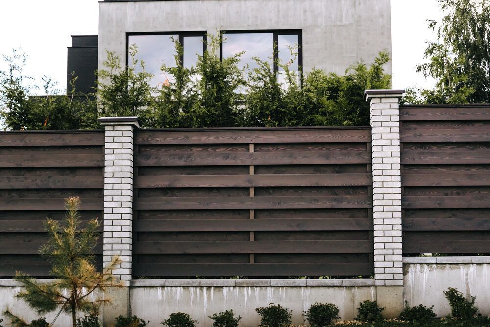 There is a Wooden Fence in Front of a House — Lakecrest Projects in Hunter Valley, NSW
