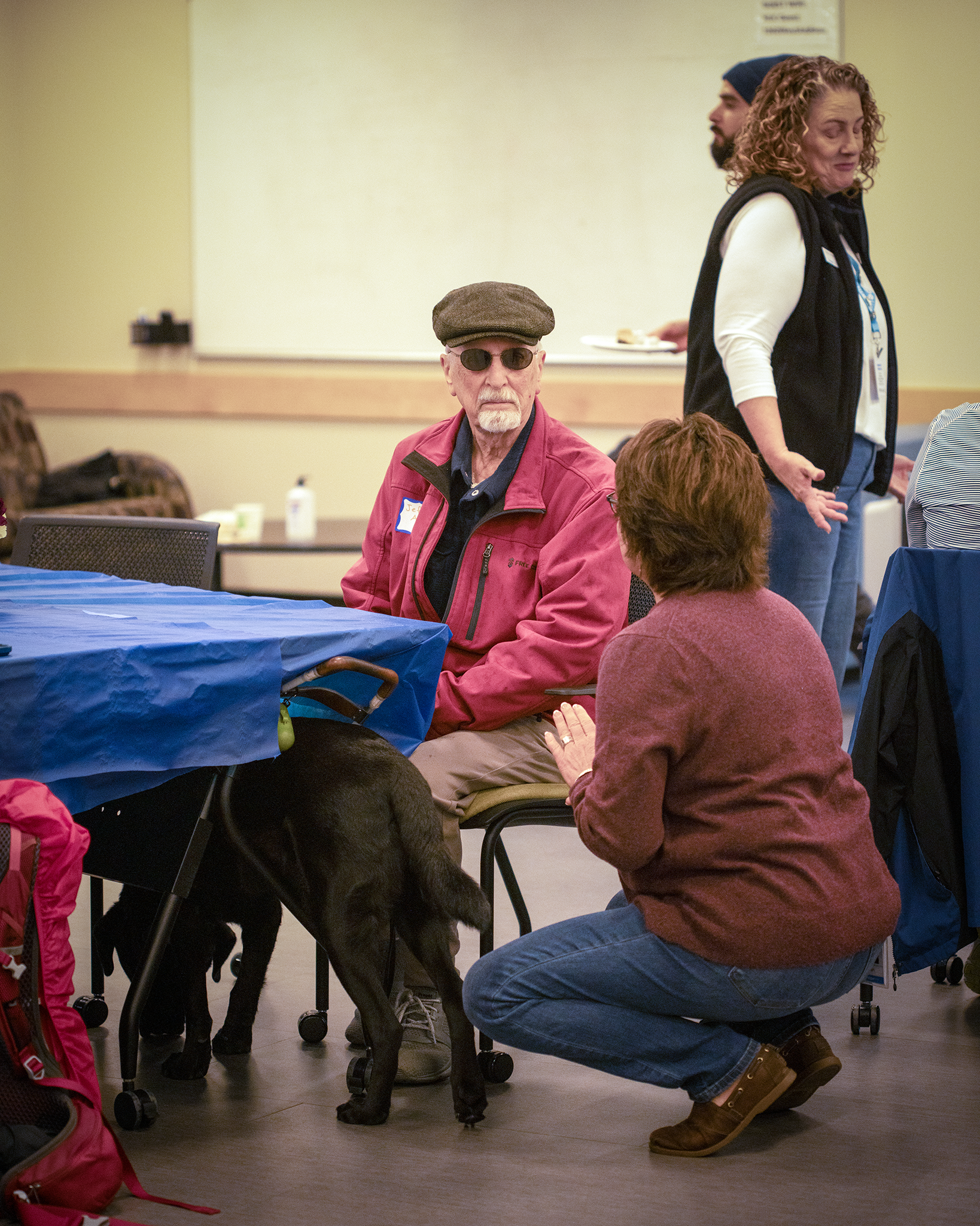 Two people talking at a table