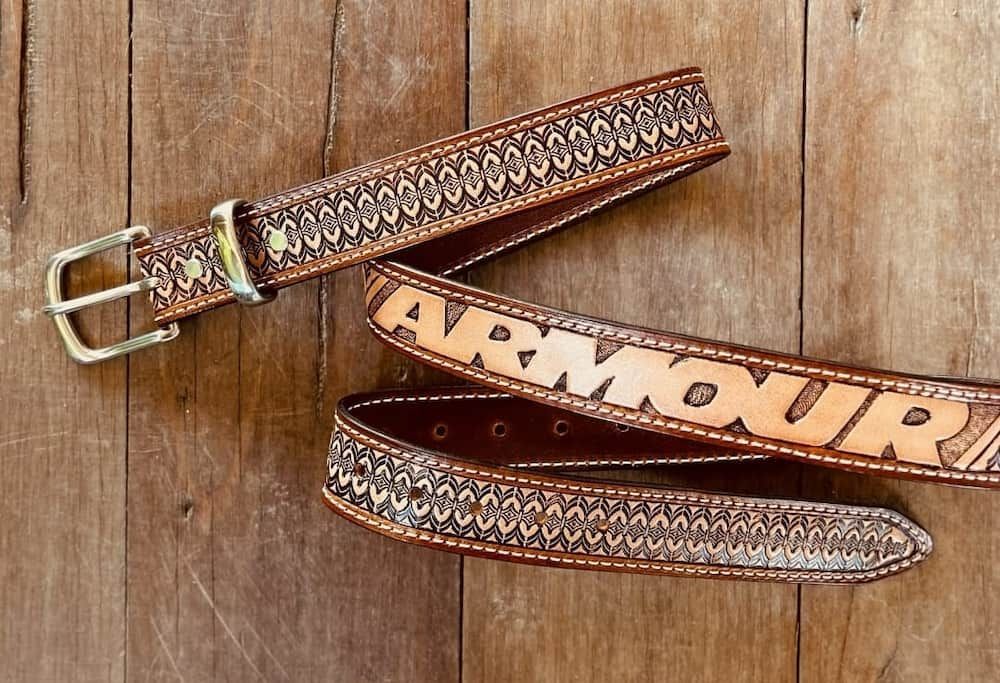 A Brown Leather Belt With The Word Armour On It — Armour Transport Logistics In Singleton, NSW