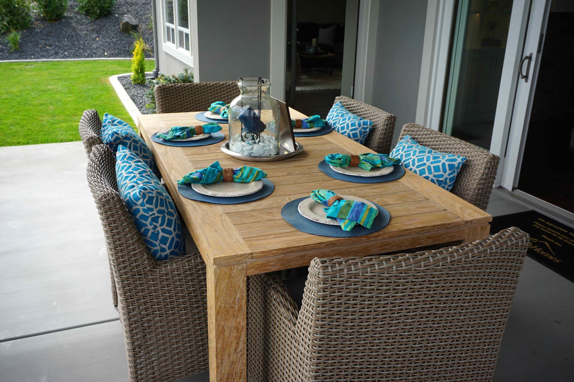 A table set for dinner on an outdoor patio