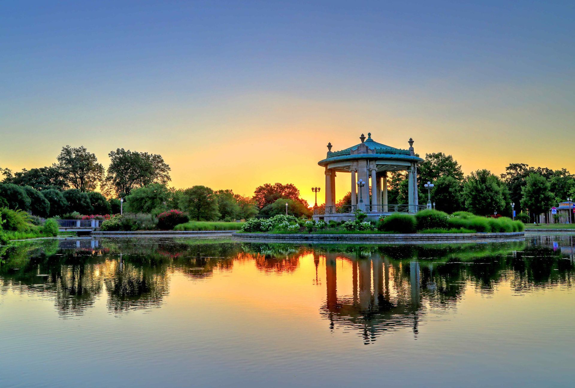 The sun sets behind the bandstand in Forest Park, St. Louis, Missouri