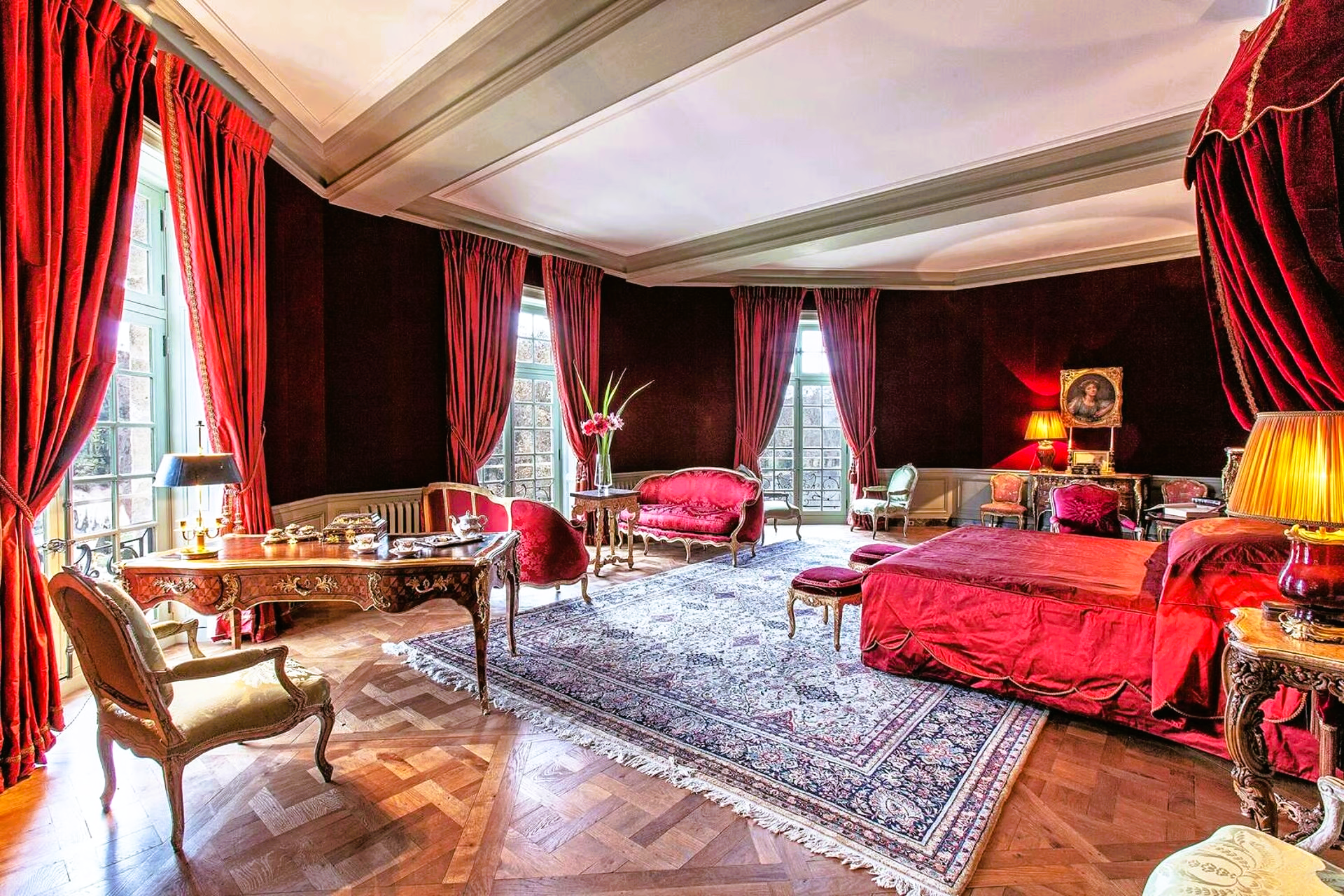 There is a large bed in the middle of the room.