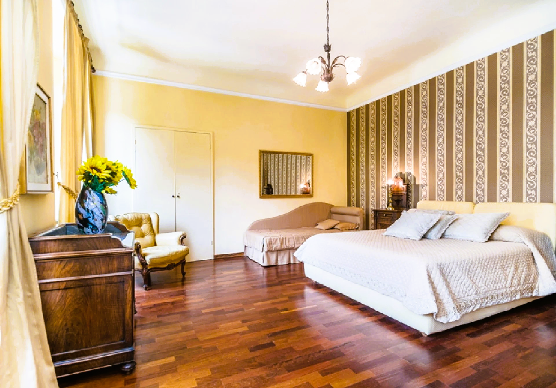 There is a large bed in the middle of the room.