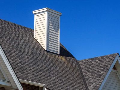 Roofing Services — Roofer Fixing the Roof in Colchester, VT