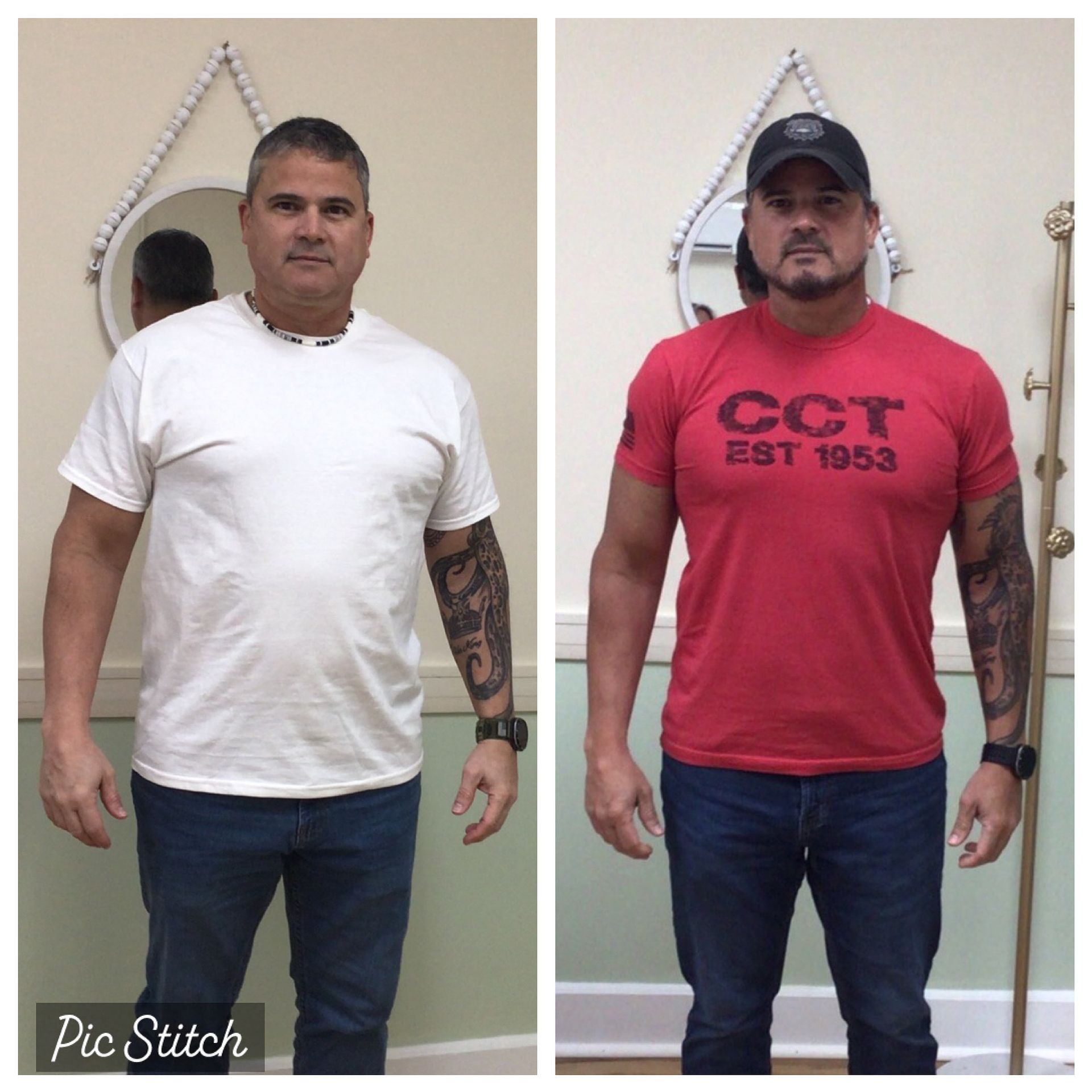 A woman is standing in a living room wearing a pair of oversized jeans.