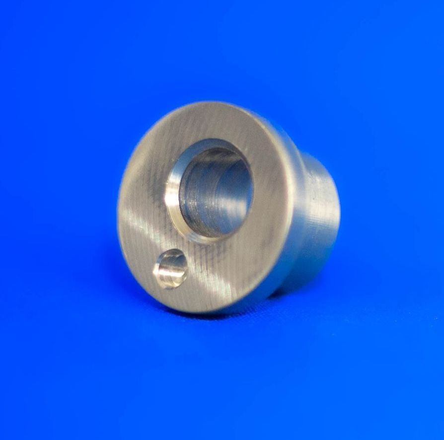 Lathe machined component