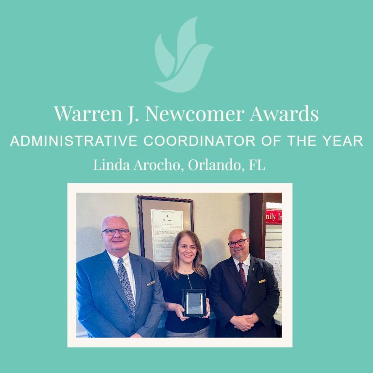 Award announcement: Linda Arocho of Orlando, FL, Administrative Coordinator of the Year, with two men, holding a plaque.