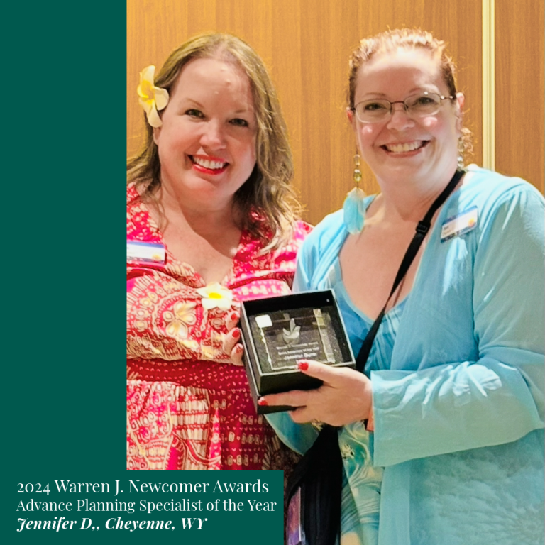 Two women smiling, holding award. Text:
