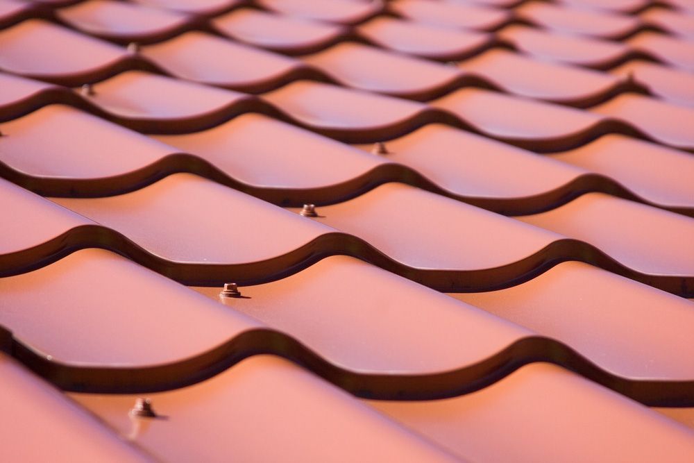 A Close Up of a Roof With a Pattern of Waves — East Coast Roof Tiling Services in Kuluin, QLD
