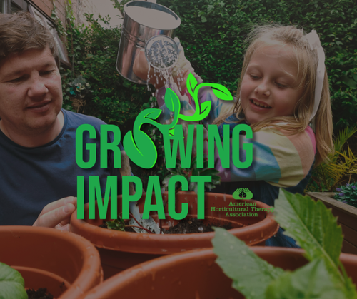 child watering potted plant