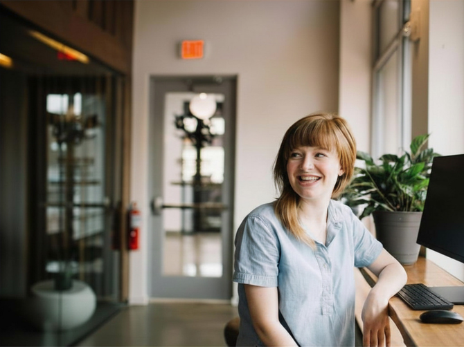 woman smiling at test center